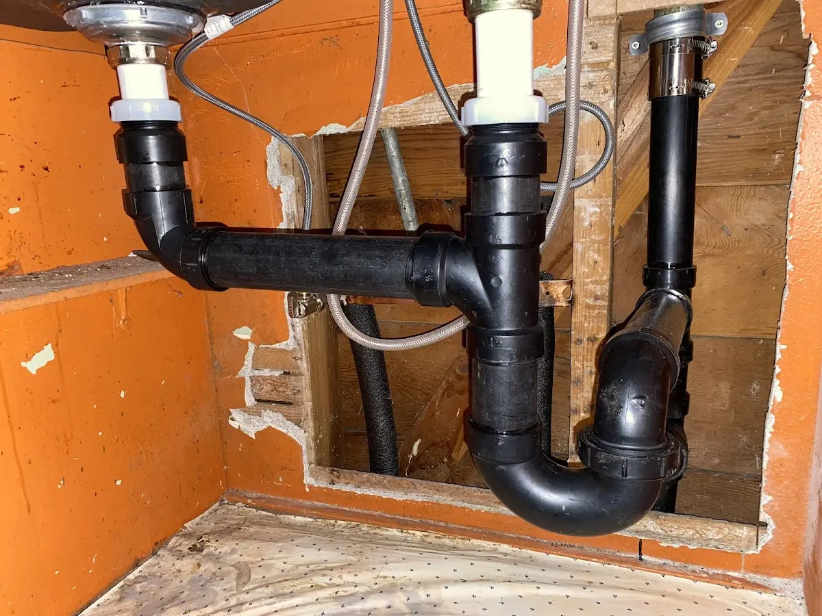 Professional Garbage Disposal Repair equipment and tools on the job in Atherton